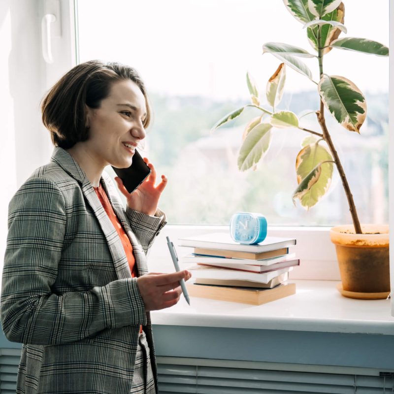 legal-business-consultant-legal-advisor-female-lawyer-businesswoman-talking-on-cell-phone.jpg